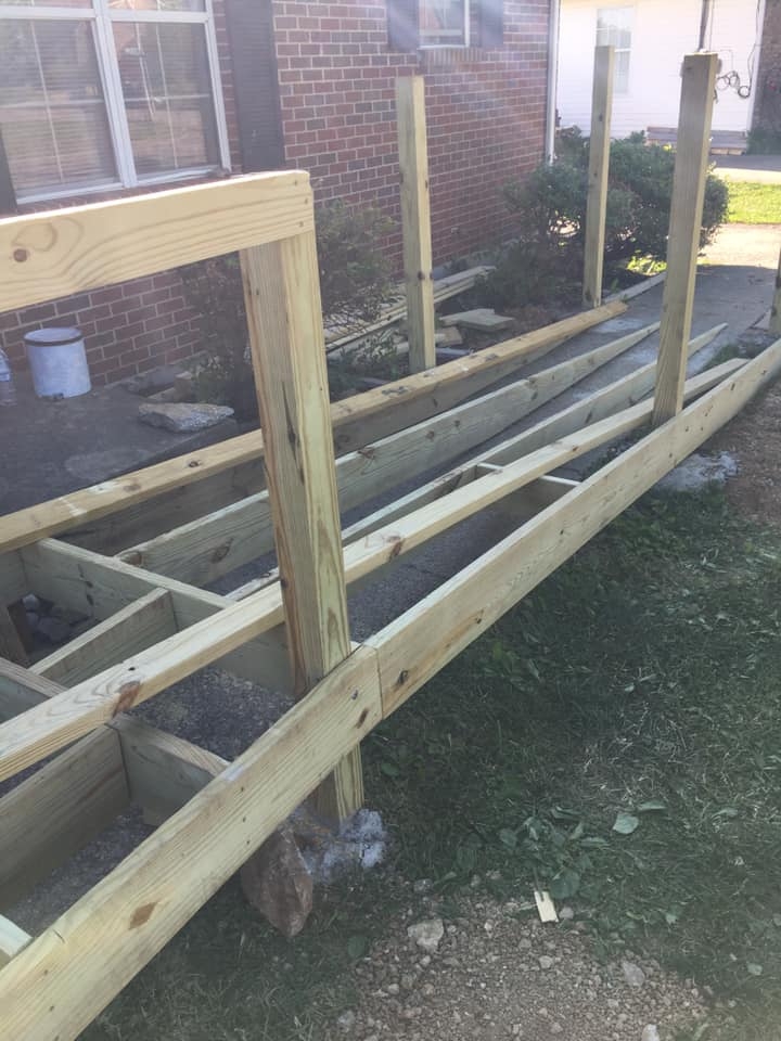 Construction on a wheel chair ramp for a Veteran